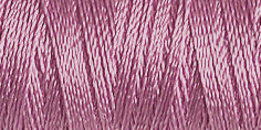 Spool of lilac coloured rayon embroidery thread. Code 1031.