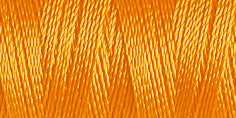 Spool of rayon embroidery thread in a clementine orange. Code 1065.