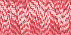 Spool of pink coloured rayon embroidery thread. Code 1108.