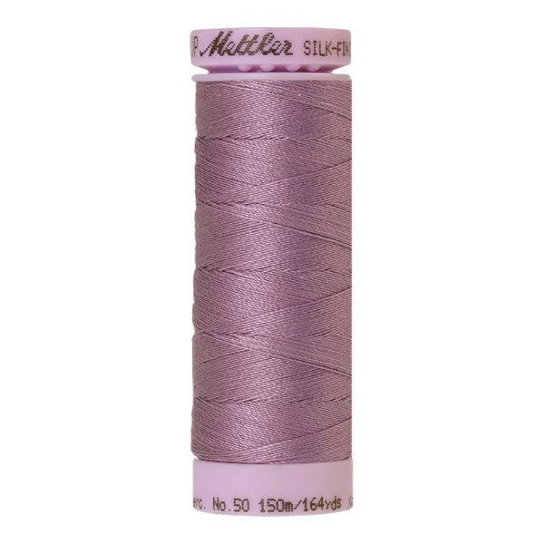 Spool of mallow lilac coloured cotton thread - code 0055