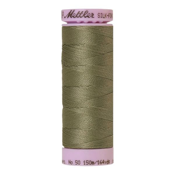 Spool of green coloured cotton thread - Sage code 0381