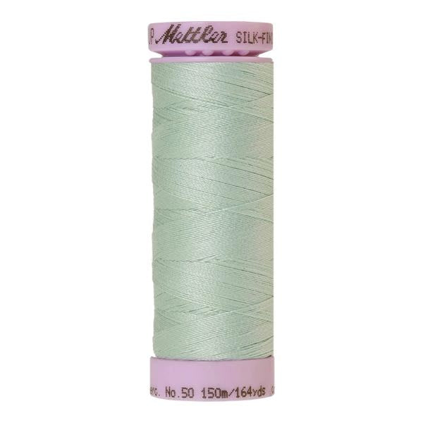 Spool of light mint green cotton thread - code 1090