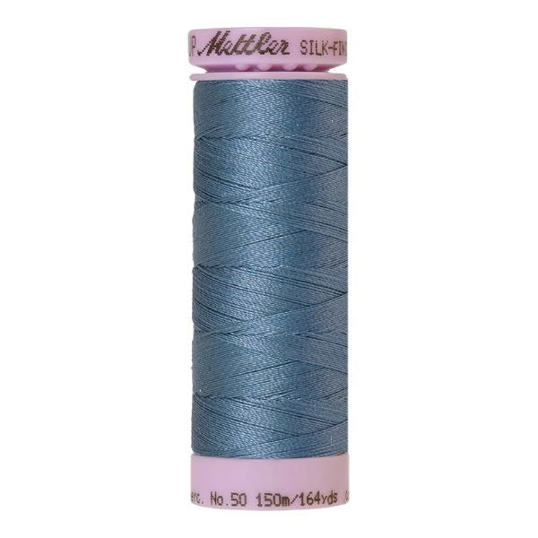 Spool of dusky blue coloured cotton thread - Laguna code 1306