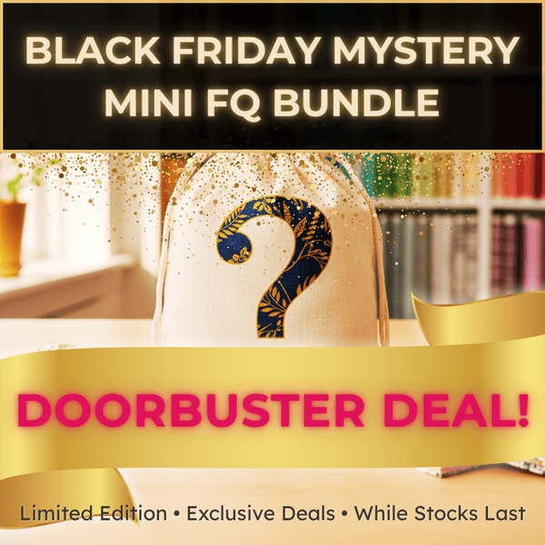 A fabric bag with a large question mark is displayed in front of shelves, advertising a Black Friday Mystery Mini FQ Bundle and highlighting a Doorbuster Deal! with exclusive, limited edition offers.