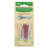 Bias tape maker in silver coloured metal with red midsection - 18mm