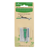 Bias tape maker in a silver coloured metal with green mid section - 6mm