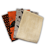 Ghostly Greetings Halloween fat quarter quilting fabric bundle with orange, black, grey and cream fabrics featuring pumpkins, spiderwebs, bats, skeletons and textured blender prints.