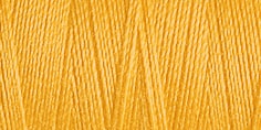 Close-up of a spool of light orange thread