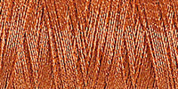 Spool of copper coloured metallic thread code 7011