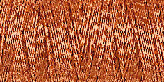 Spool of copper coloured metallic thread code 7011