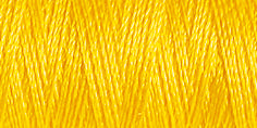 Spool of rayon embroidery thread in a sunflower yellow. Code 1023.