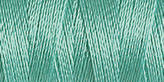 Spool of light turquoise coloured rayon embroidery thread. Code 1045.