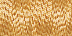 Spool of rayon embroidery thread in a warm beige. Code 1055