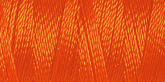 Spool of orange rayon embroidery thread. Code 1078.