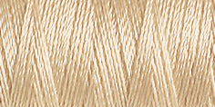 Spool of cream rayon embroidery thread. Code 1082.