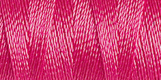 Spool of dark pink coloured rayon embroidery thread. Code 1109.