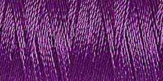 Spool of iris purple coloured rayon embroidery thread. Code 1122.