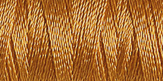 Spool of beige-brown rayon embroidery thread. Code 1126.