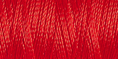 Spool of dark red rayon embroidery thread. Code 1147.