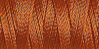 Spool of reddy brown rayon embroidery thread. Code 1158.
