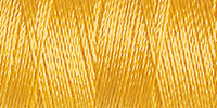 Spool of rayon embroidery thread in a mustard yellow. Code 1167.