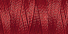 Spool of claret red rayon embroidery thread. Code 1169.