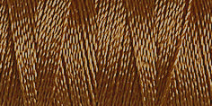 Spool of muddy brown rayon embroidery thread. Code 1170.
