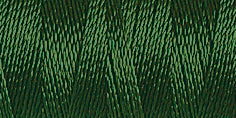 Spool of forest green coloured rayon embroidery thread. Code 1174.