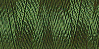 Spool of dark green coloured rayon embroidery thread. Code 1175.