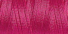Spool of burgundy coloured rayon embroidery thread. Code 1191.