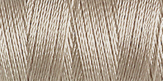 Spool of light beige coloured rayon embroidery thread. Code 1218.