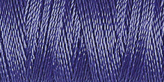 Spool of denim blue coloured rayon embroidery thread. Code 1226.
