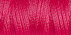 Spool of hot pink coloured rayon embroidery thread. Code 1231.