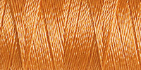 Spool of peach rayon embroidery thread. Code 1239.