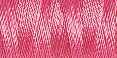 Spool of medium pink coloured rayon embroidery thread. Code 1256.