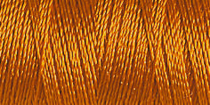 Spool of copper rayon embroider thread. Code 568.
