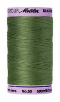 A 500m spool of Mettler silk coated cotton thread in soft green (code 0840), ideal for piecing.
