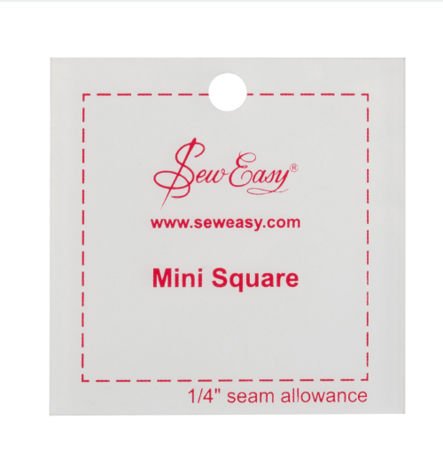A clear 2.5" acrylic square template giving a finished size of 2" square