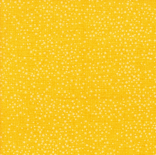 Yellow fabric texture with a subtle dots