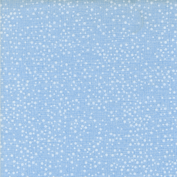 Blue fabric texture with small white dots