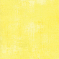 Lemon coloured fabric with a grunge distressed look