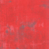 Distressed look quilting fabric in geranium red