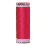 A 150m spool of Mettler silk coated cotton thread in fuscia (code 1421), ideal for piecing.