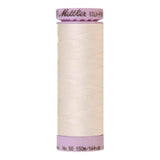 A 150m spool of Mettler silk coated cotton thread in a light ivory cream (code 3000), ideal for piecing.