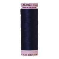 Spool of dark indigo coloured cotton thread - code 0016
