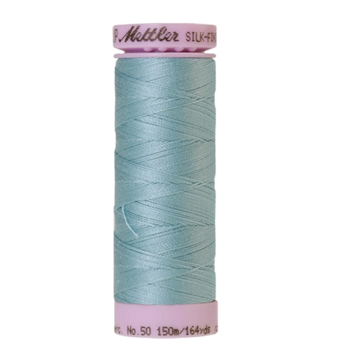 Spool of light blue coloured cotton thread - Rough Sea code 0020