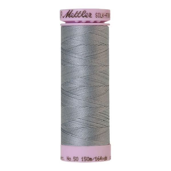 Spool of light soft blue cotton thread - code 0042
