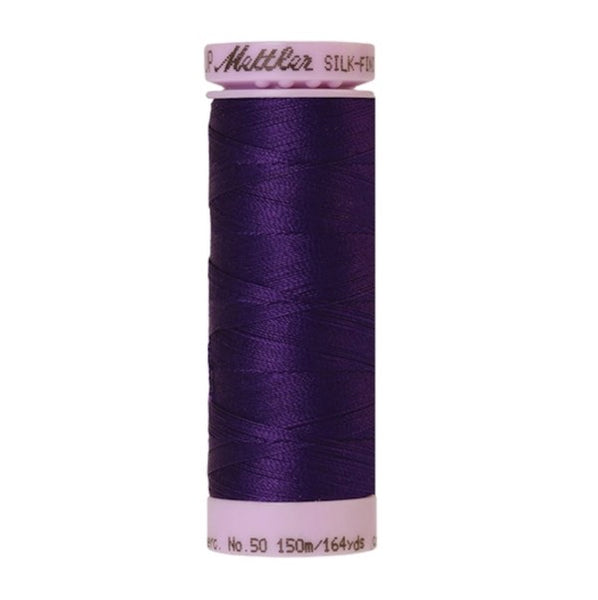 Spool of deep purple coloured cotton thread - code 0046