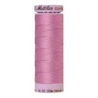 Spool of light mauve cotton thread - code 0052