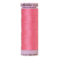 Spool of cotton thread in roseate pink - code 0067